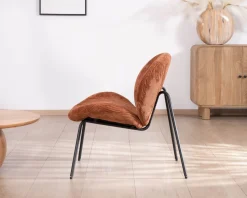 Fauteuil lounge design en velours côtelé rouille